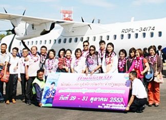 History being made - passengers prepare to board Laos Airlines flight QV410 from U-Tapao to Luang Prabang in Laos, becoming the first to do so.